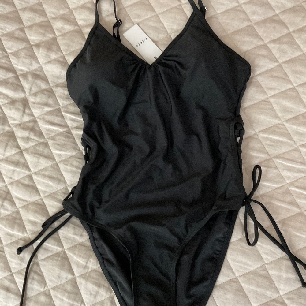NEW with TAGS Pieces Black Side Lace Up One Piece Swimsuit - L